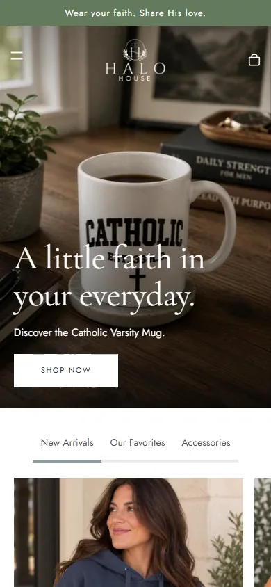 The Halo House storefront homepage on a phone: the headline A little faith in your everyday over the Catholic Varsity Mug, with a Shop now button